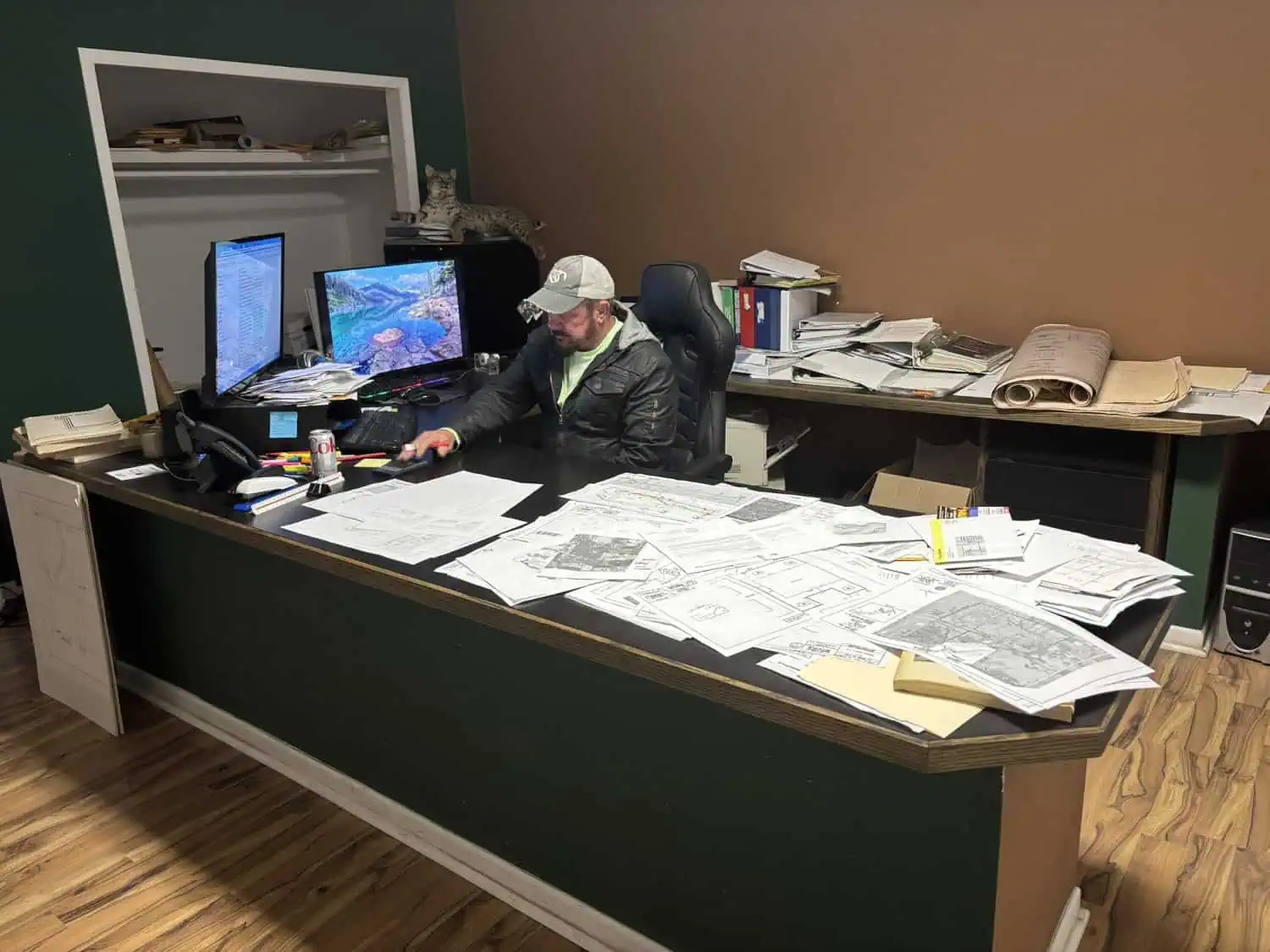 Jason Swaim at his desk in the Bowie office