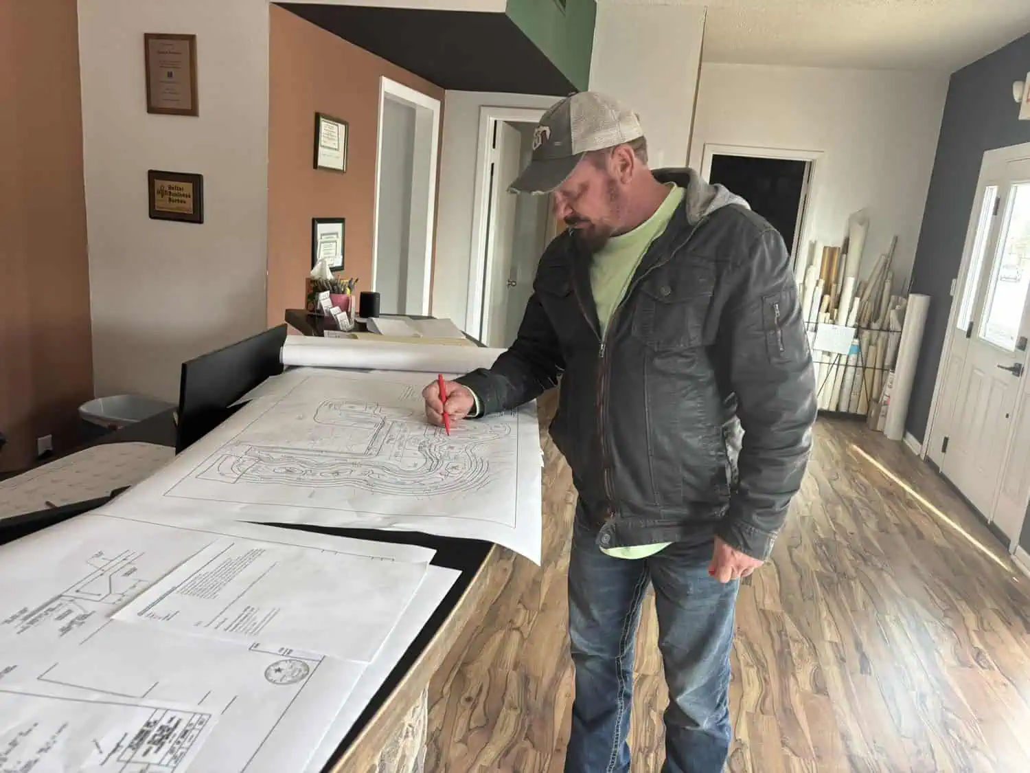 Jason Swaim reviewing design diagrams