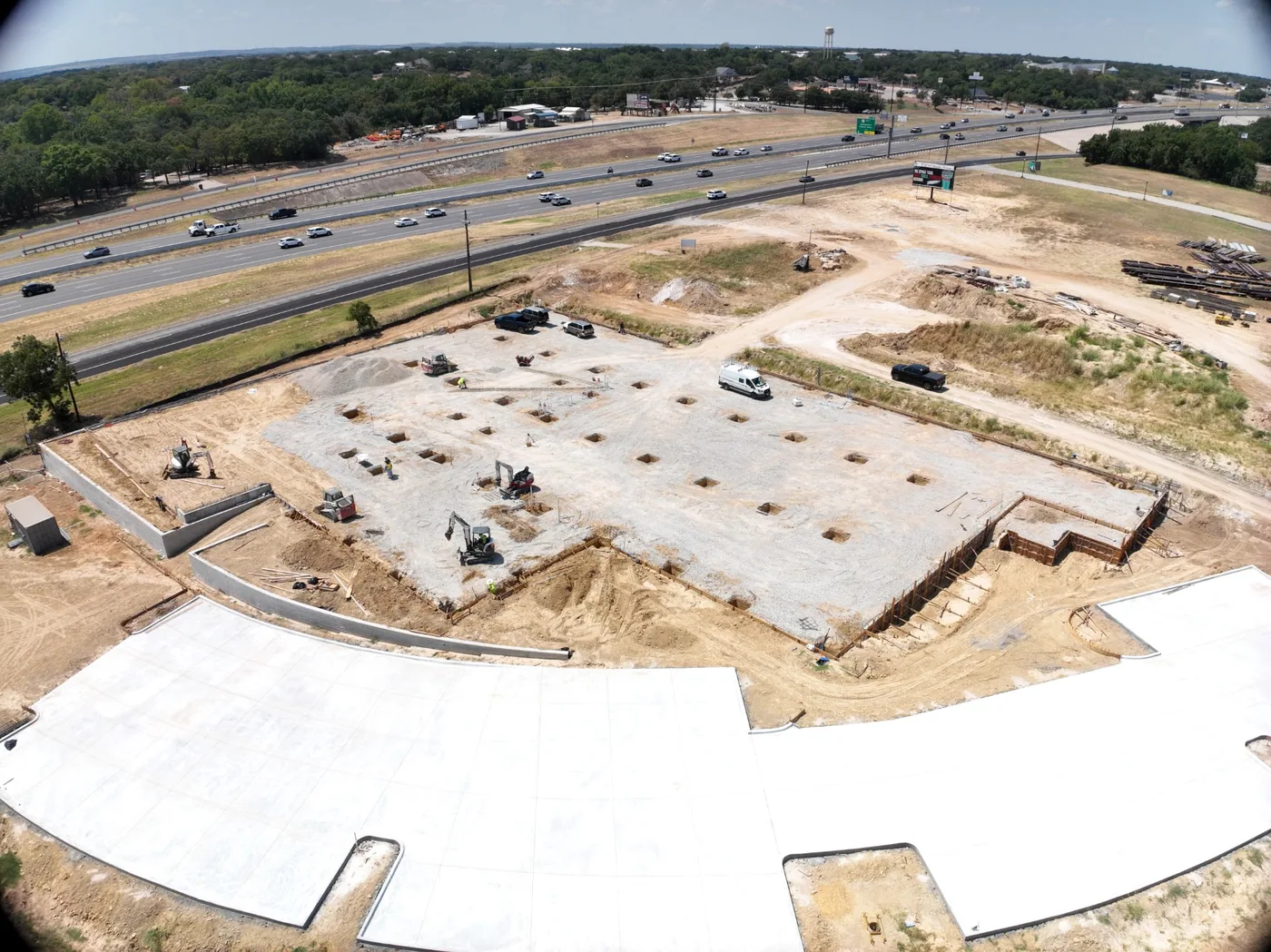 Aerial view of the Adobe Interiors site and parking